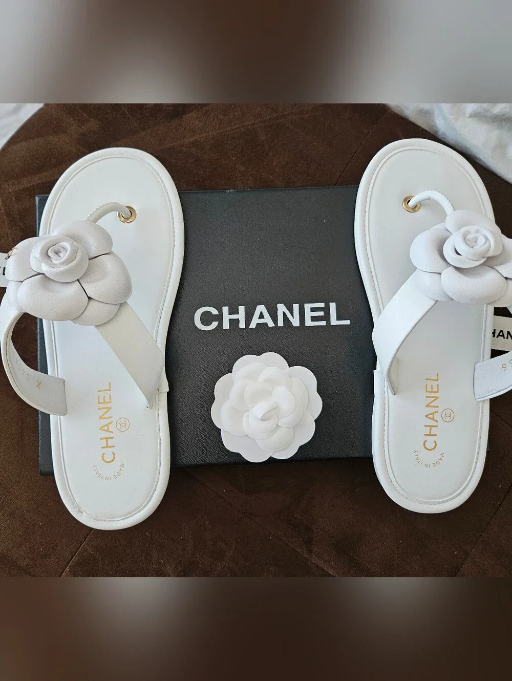 CHANEL White Camellia Leather Slide Sandals with Gold Eyelets